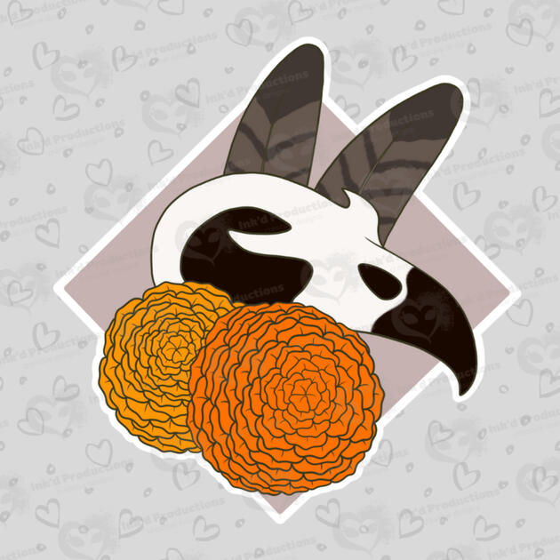 A golden eagle skull with two golden eagle feathers, two marigold flowers, and a mauve-brown background